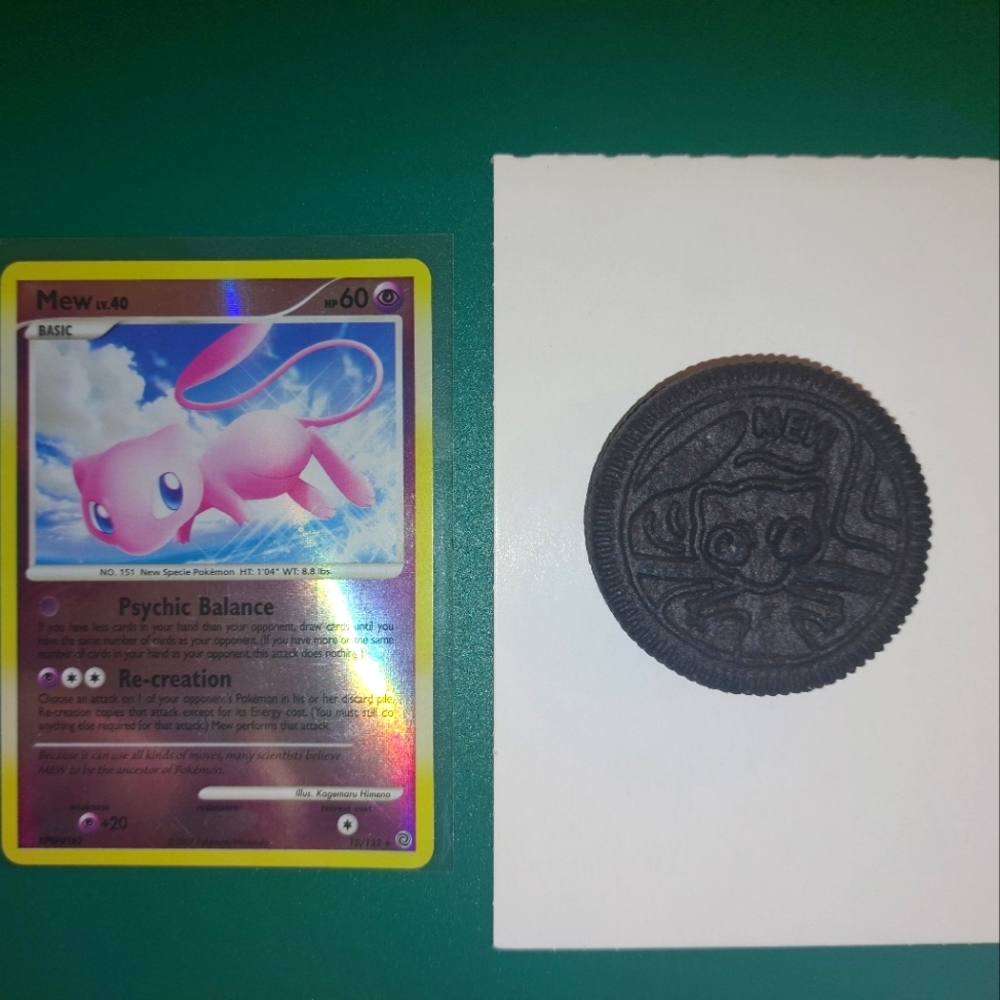 Pokemon card and rare mew